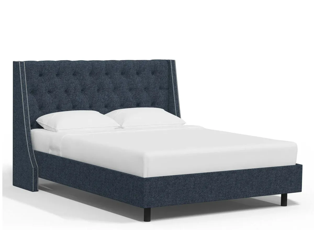 Sheridan Wingback Platform Bed in Zuma Navy by Skyline