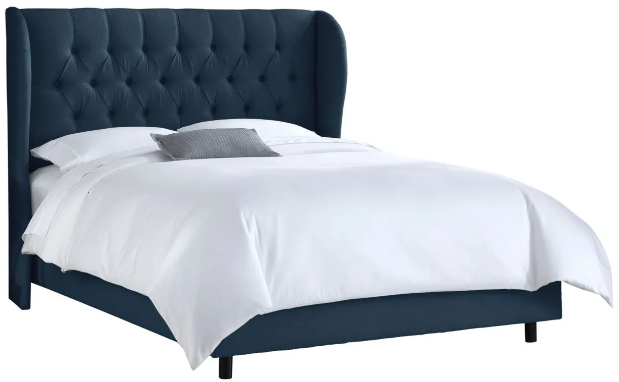 Thayer Wingback Bed in Linen Navy by Skyline