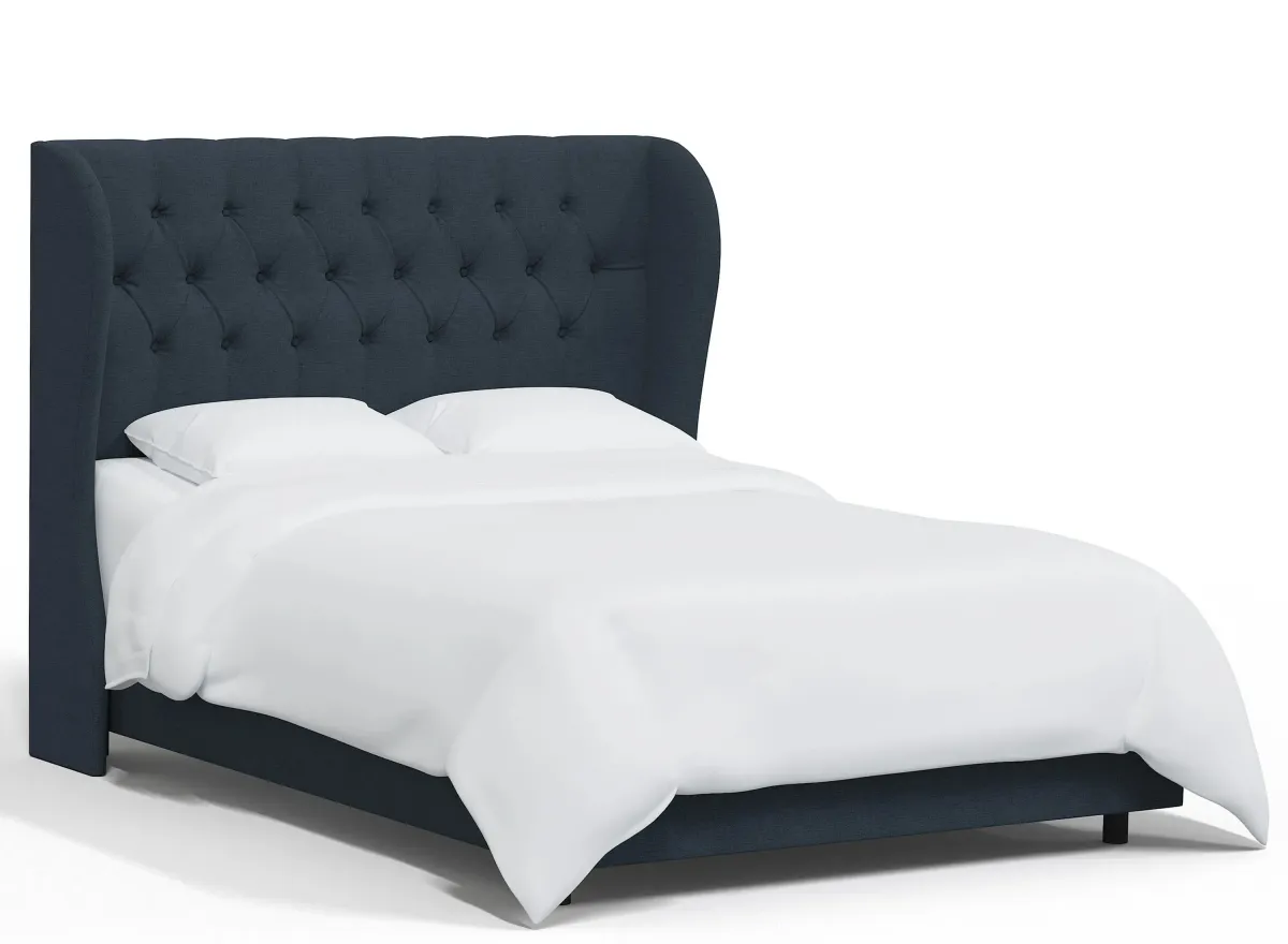 Thayer Wingback Bed in Linen Navy by Skyline