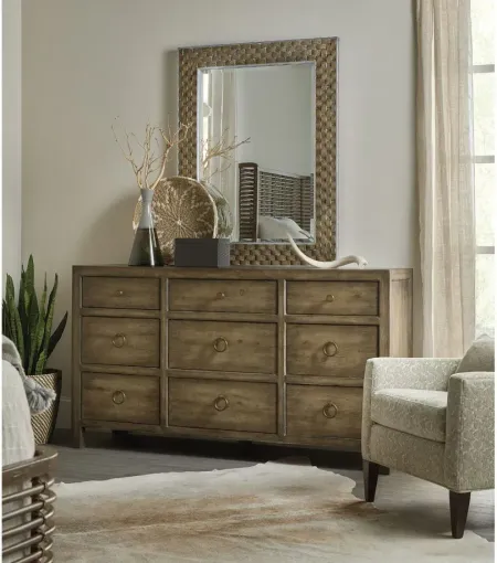 Sundance Portrait Mirror in Dark brown layered simulated cork with silver colored frame by Hooker Furniture