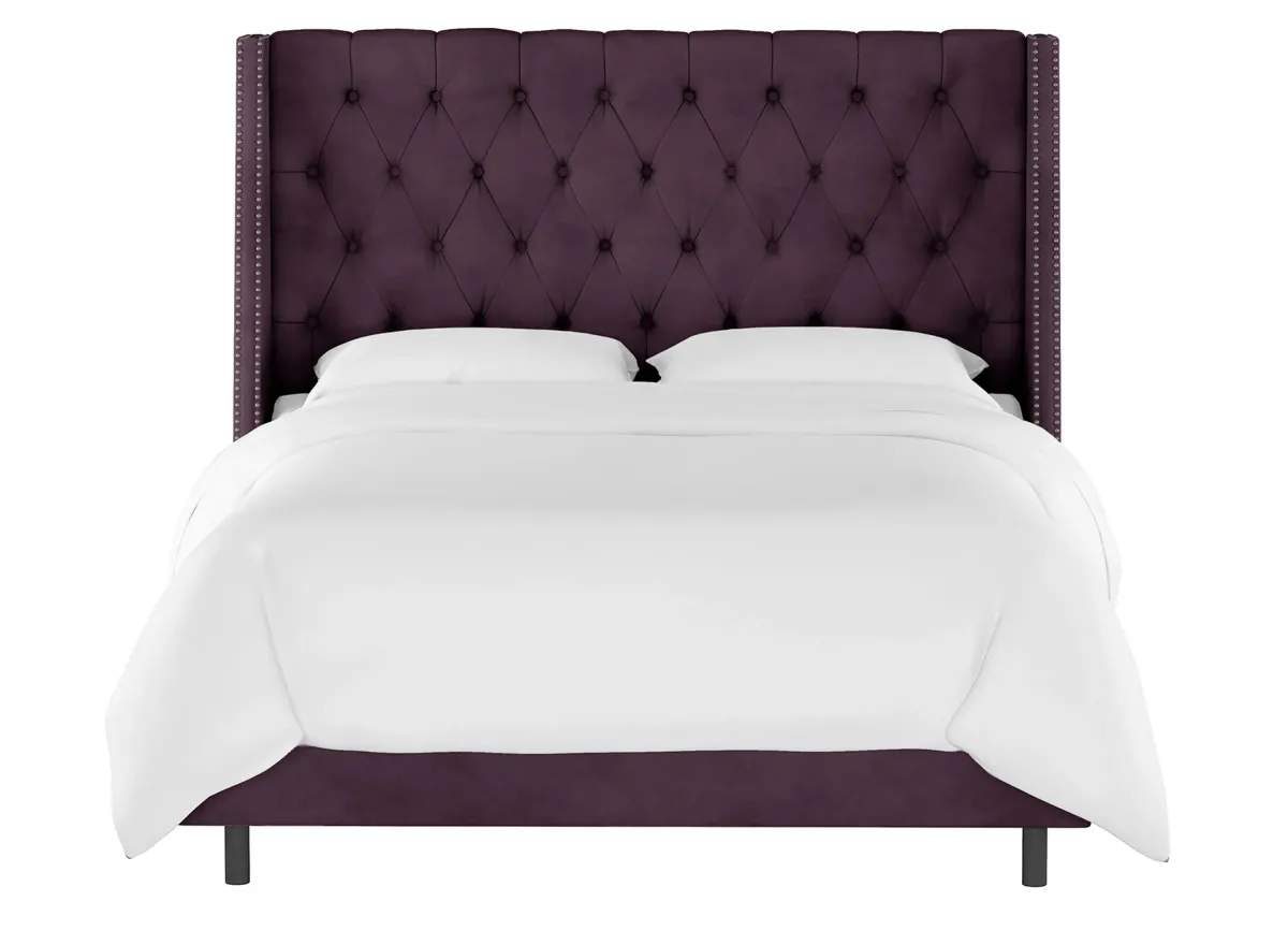 Sheridan Wingback Bed in Velvet Aubergine by Skyline