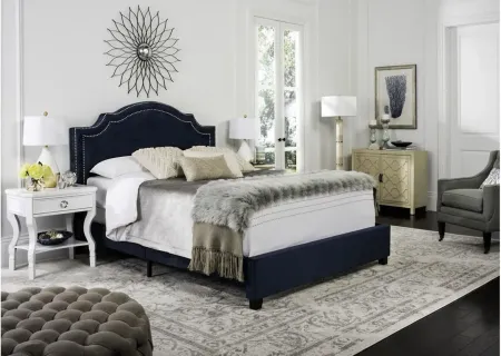 Theron Upholstered Bed in Navy by Safavieh