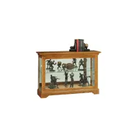 Underhill Curio Cabinet in Golden Oak by Howard Miller Clock