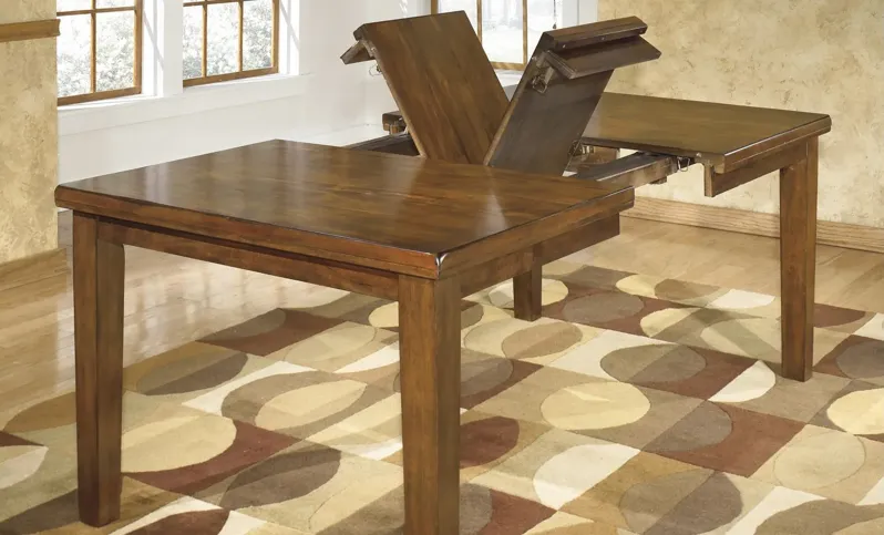 Fowler Dining Table w/ Leaf in Medium Brown by Ashley Furniture