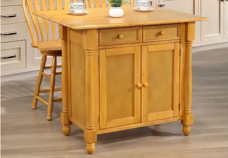 Oak Selections Kitchen Island with Drop Leaf Top in Light oak finish by Sunset Trading