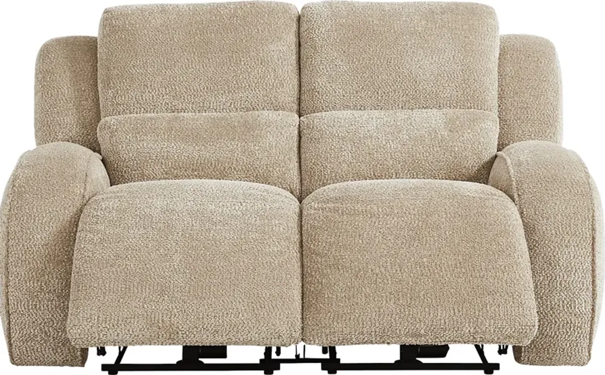 Crestwood Tan Reclining Loveseat