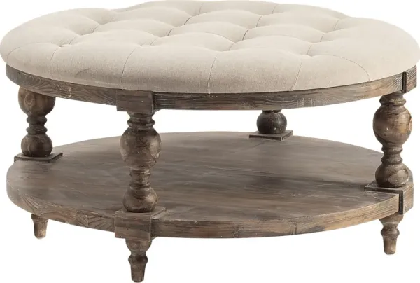 Hughlyn Cream Accent Ottoman