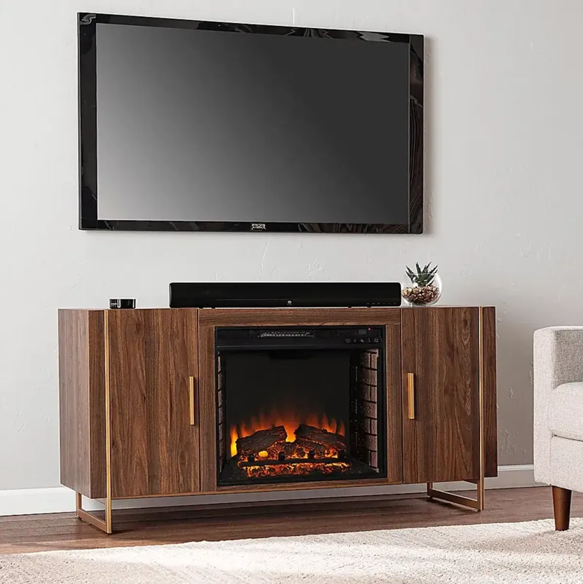 Buckthorne II Brown 55 in. Console With Electric Log Fireplace