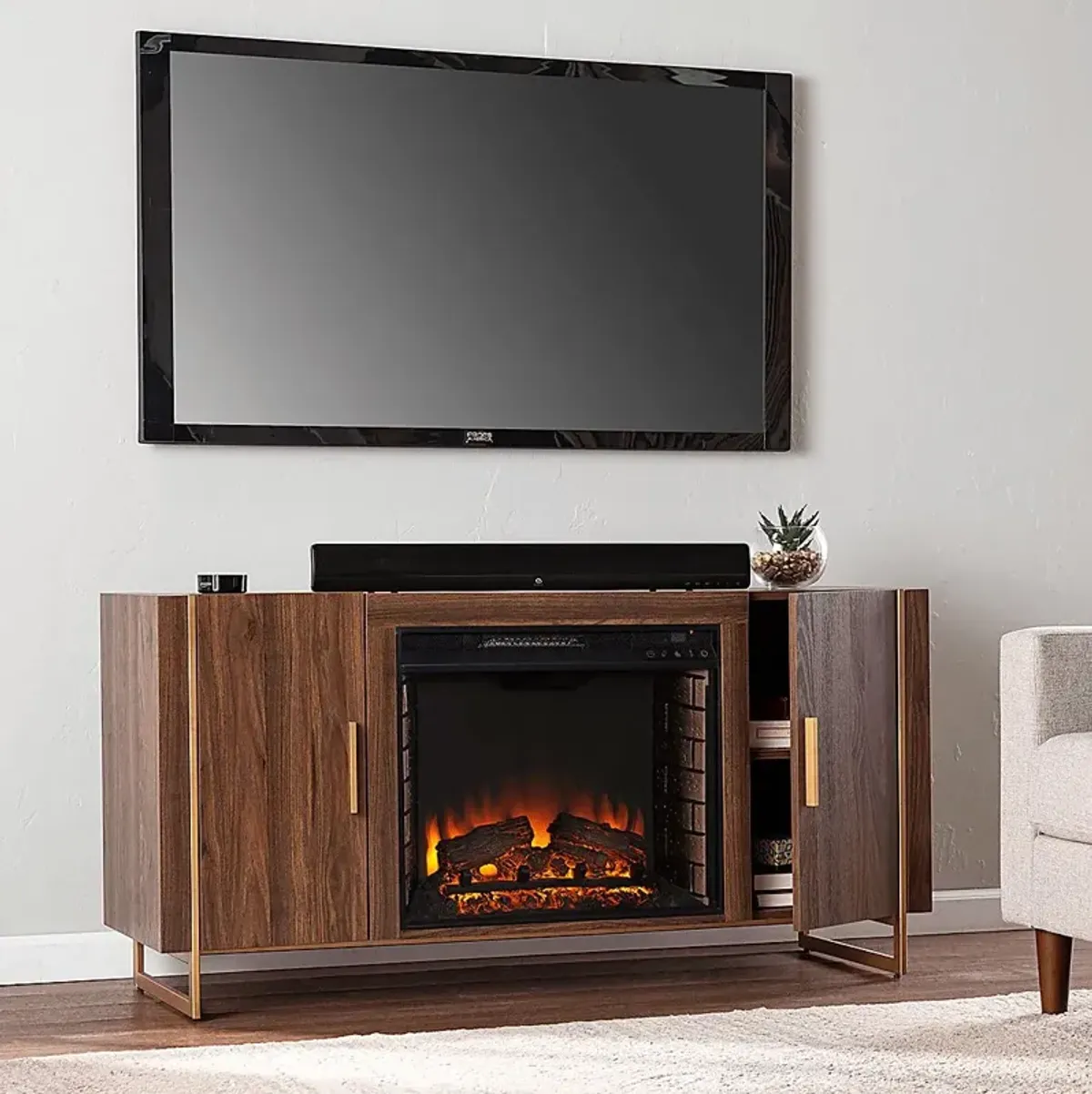 Buckthorne II Brown 55 in. Console With Electric Log Fireplace