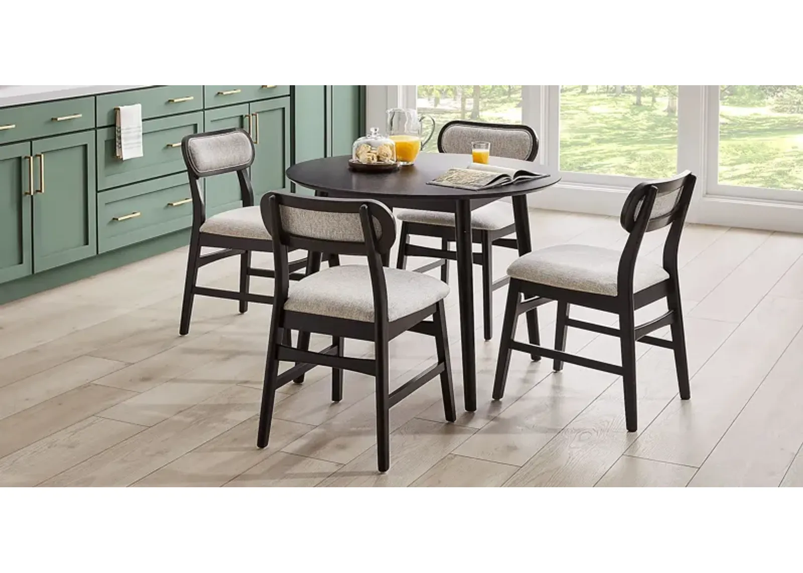 Watertown Black 5 Pc Round Dining Room with Upholstered Chairs