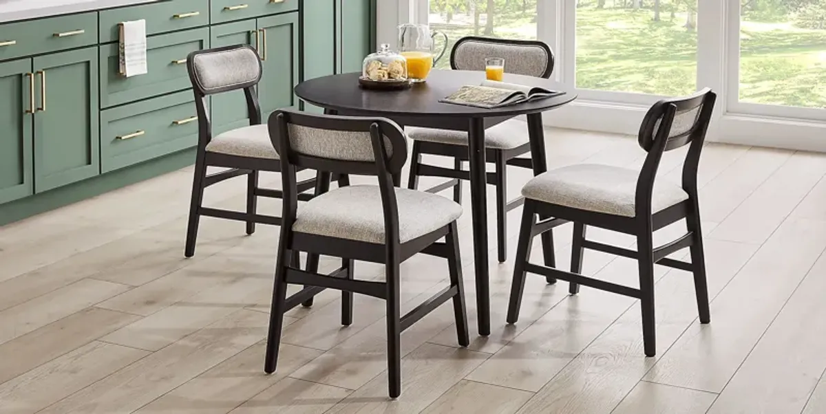 Watertown Black 5 Pc Round Dining Room with Upholstered Chairs