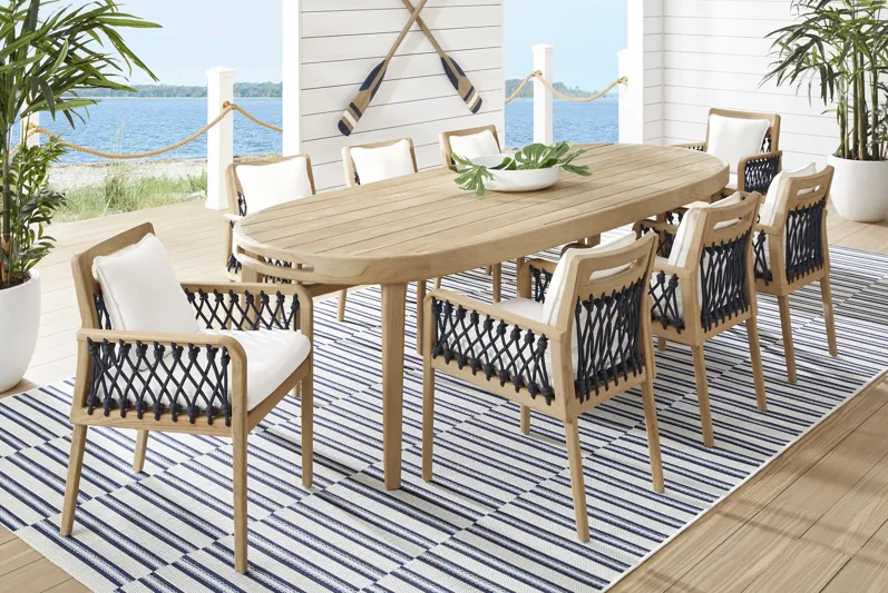 Riva Blonde 7 Pc Large Oval Outdoor Dining Set with White Cushions