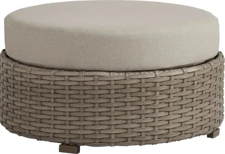Siesta Key Driftwood Round Outdoor Ottoman with Sand Cushions