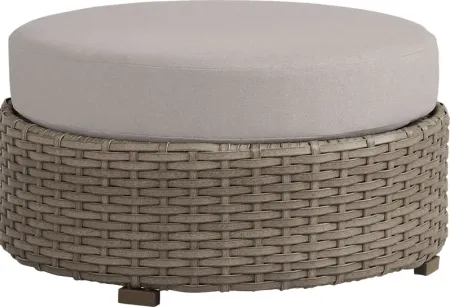 Siesta Key Driftwood Round Outdoor Ottoman with Rollo Linen Cushions
