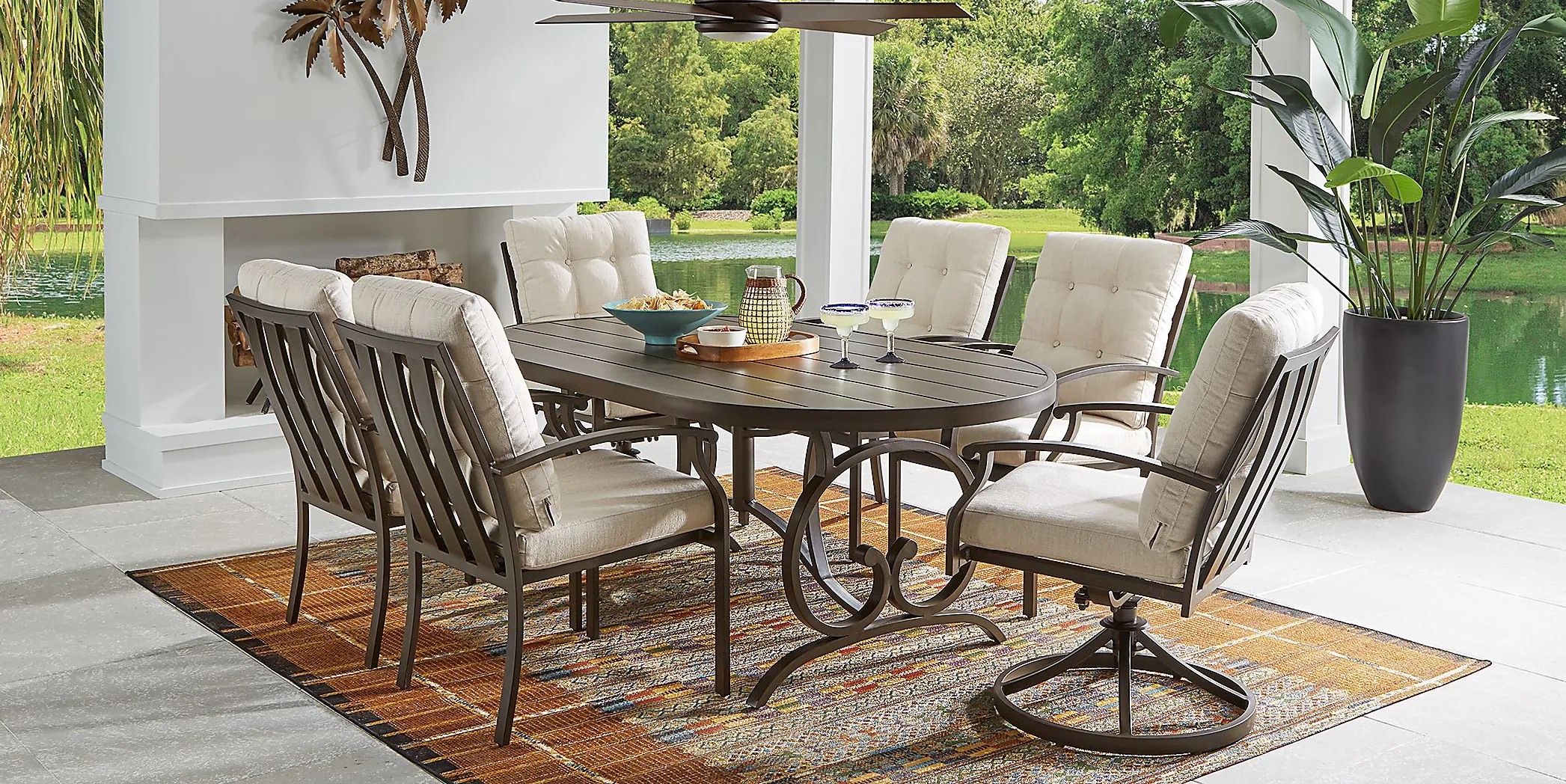 Lake Breeze Aged Bronze 7 Pc Outdoor 78 in. Oval Dining Set with Parchment Cushions