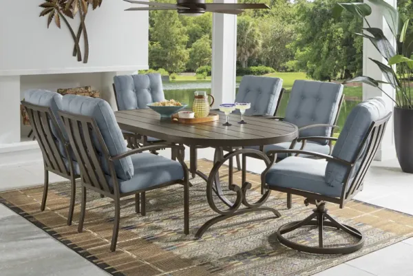 Lake Breeze Aged Bronze 7 Pc Oval Outdoor Dining Set with Blueberry Cushions