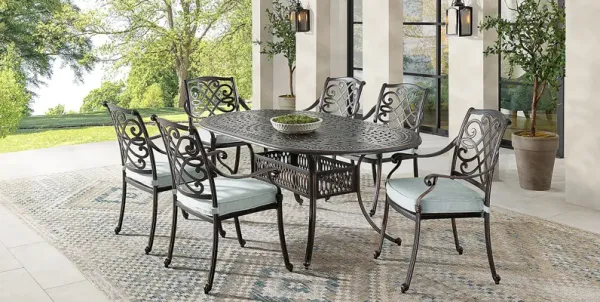 Carina Bronze 7 Pc Oval Outdoor Dining Set with Sky Cushions