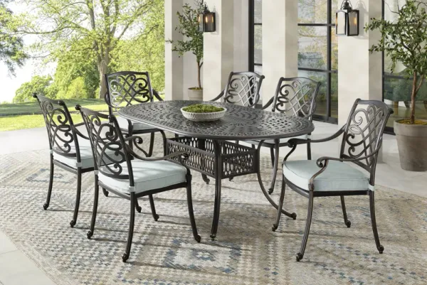 Carina Bronze 7 Pc Oval Outdoor Dining Set with Sky Cushions