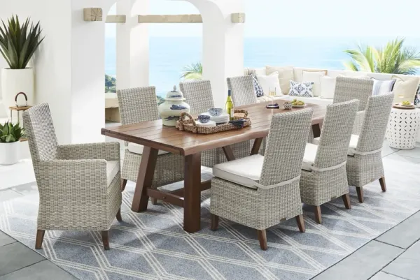 Patmos Tan 9 Pc 102 in. Rectangle Outdoor Dining Set With Linen Cushions