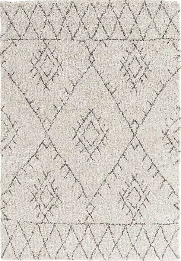Reidwick Cream 5'4 x 7'7 Area Rug