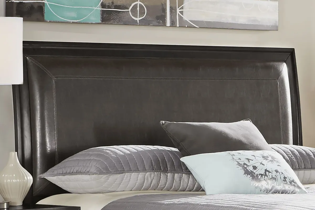 Belcourt Black 7 Pc Queen Upholstered Sleigh Arch Bedroom