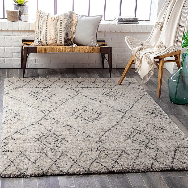 Reidwick Cream 7'11 x 10'11 Area Rug