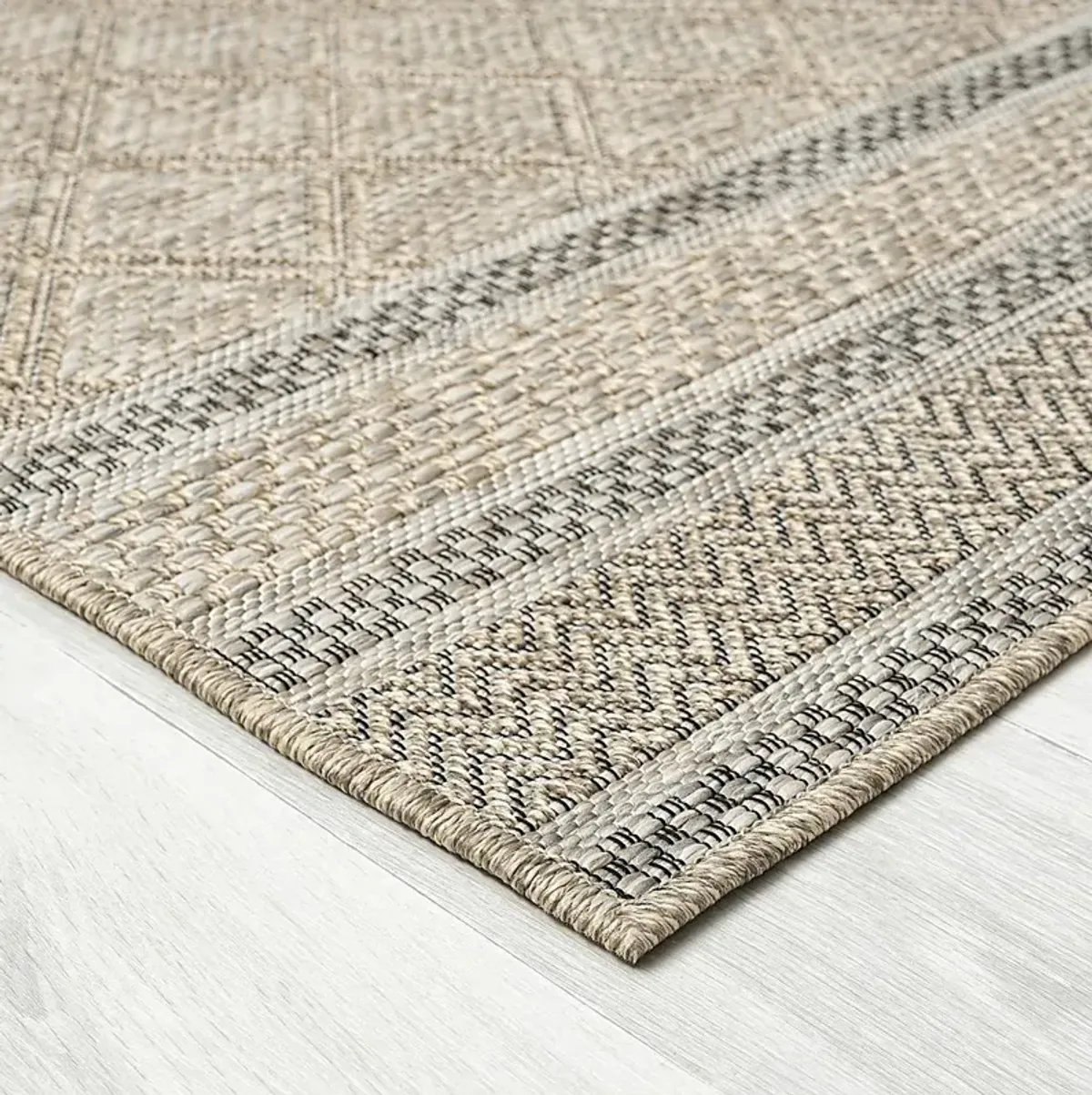 Penmont Tan 5' x 7' Indoor/Outdoor Rug