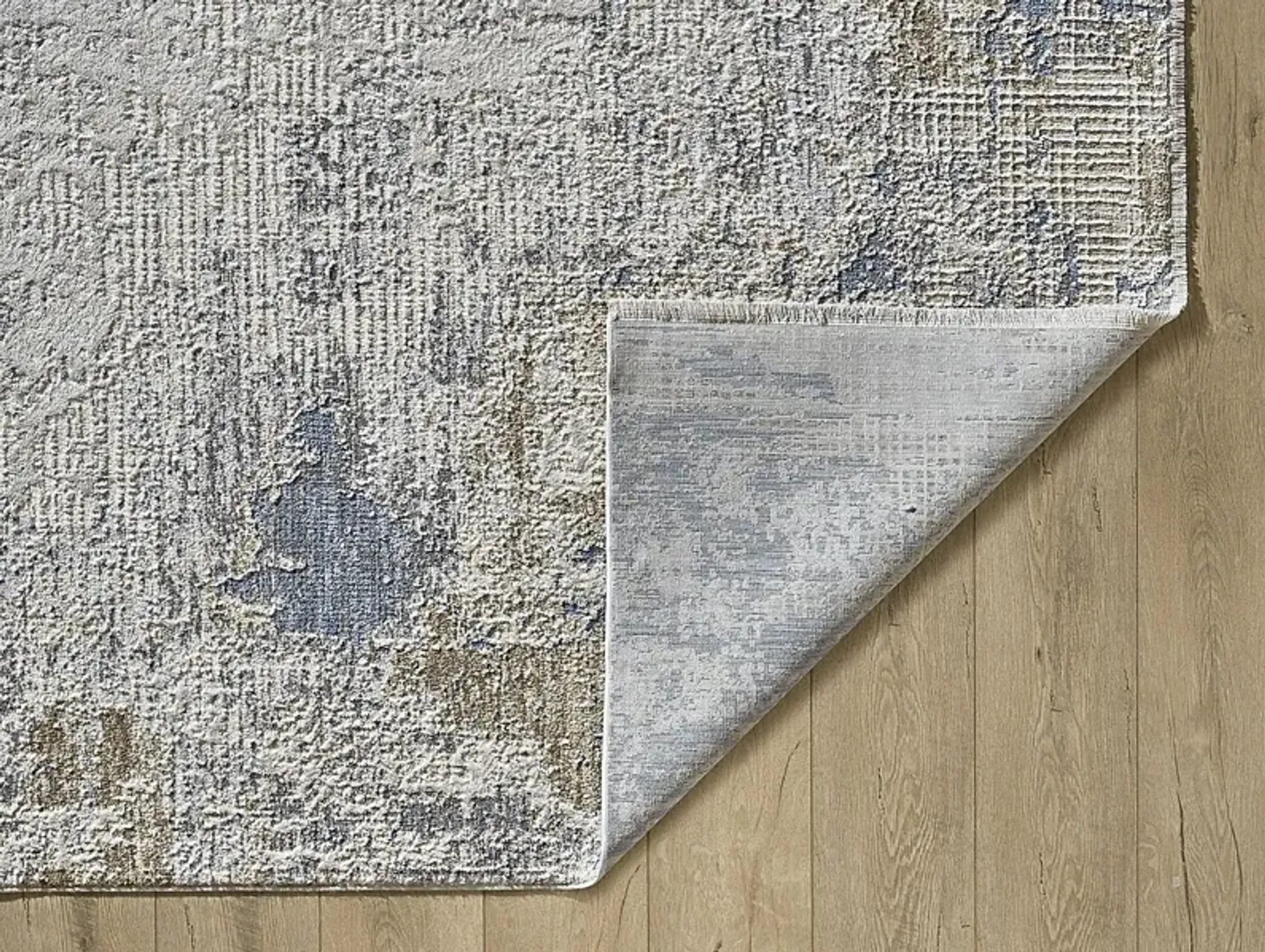 Bromtona Ivoryblue 53 X 710 Rug Rooms To Go | Furniture.com