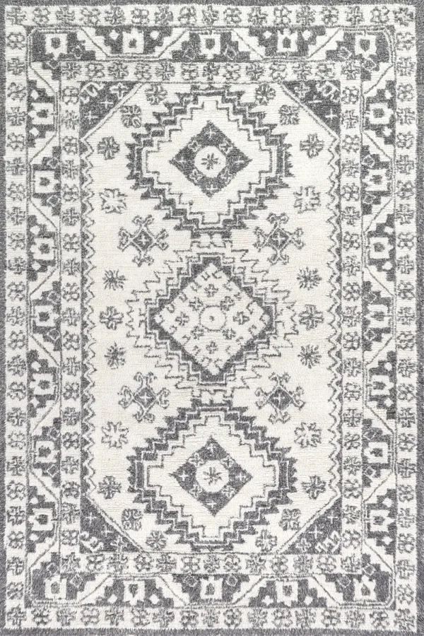 Rudie Traditional Bordered Rug