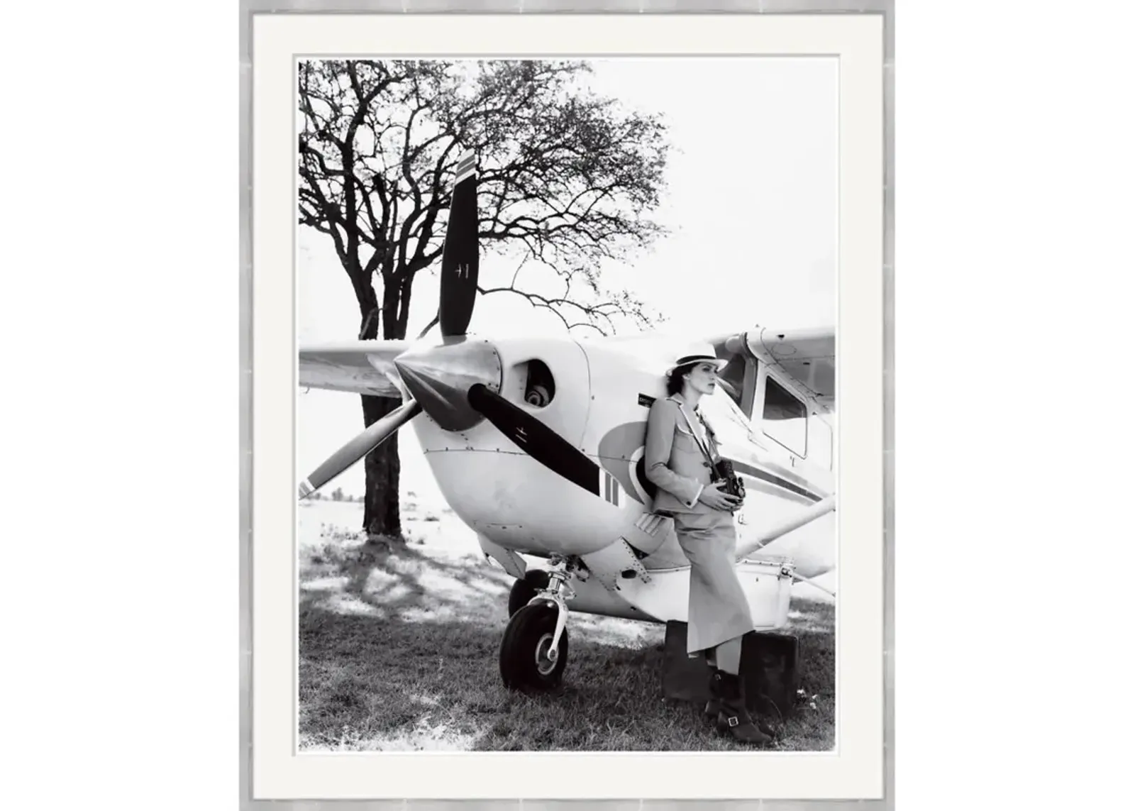 Vogue Magazine 'Keira Knightley Leaning on Plane' by Arthur Elgort, June 2007