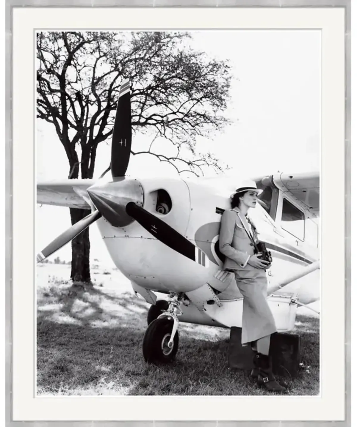 Vogue Magazine 'Keira Knightley Leaning on Plane' by Arthur Elgort, June 2007