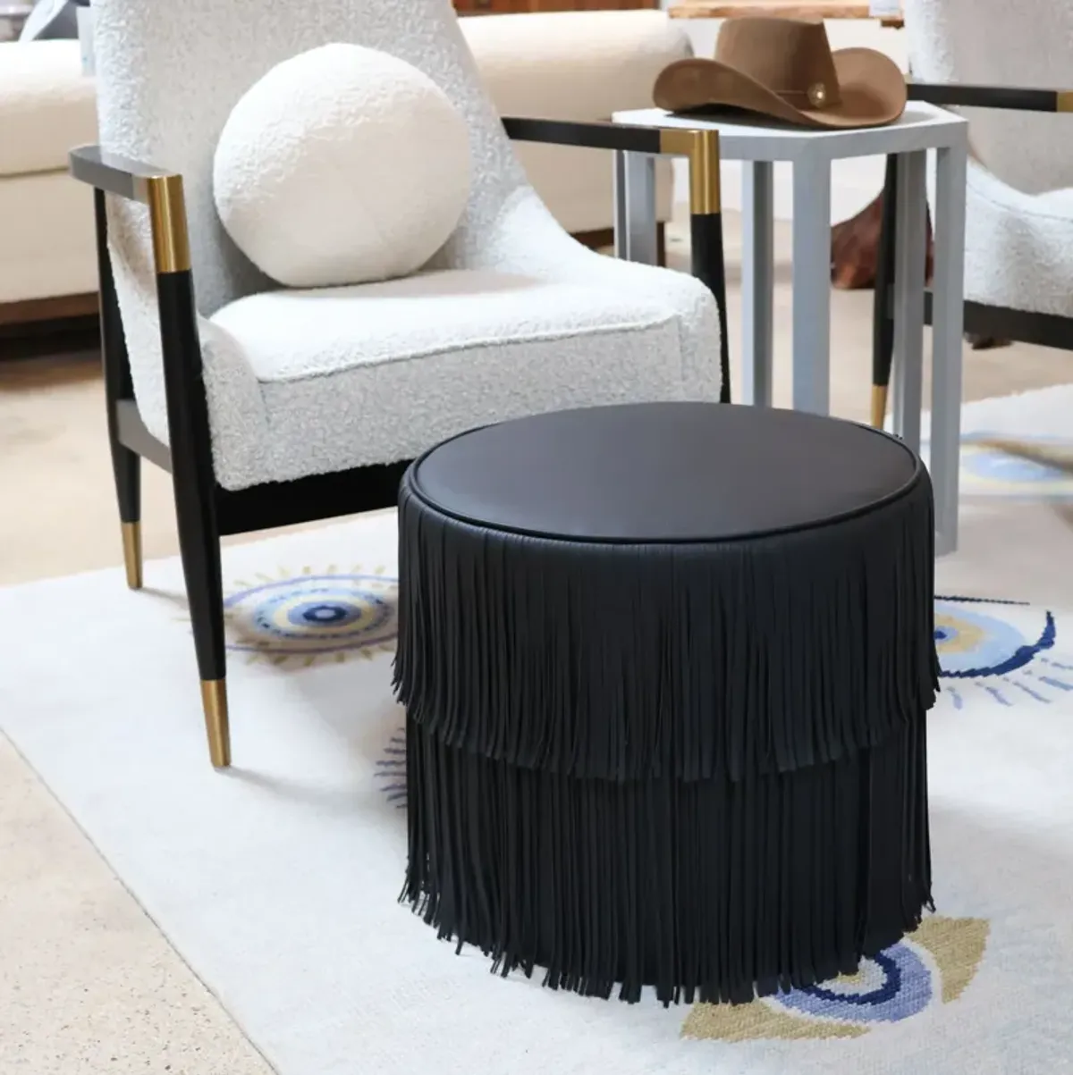 Chaser Ottoman in Black Leather