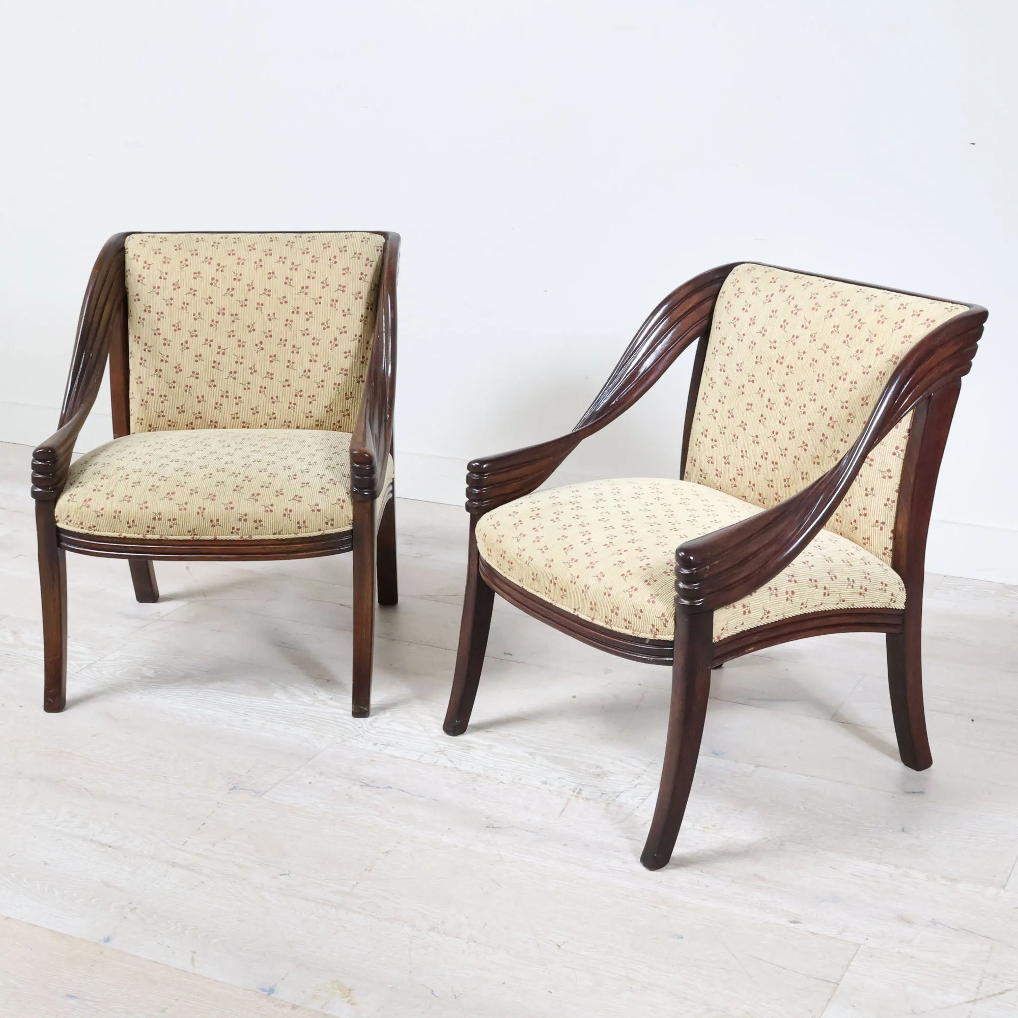 Pair of Curved Arm Chairs