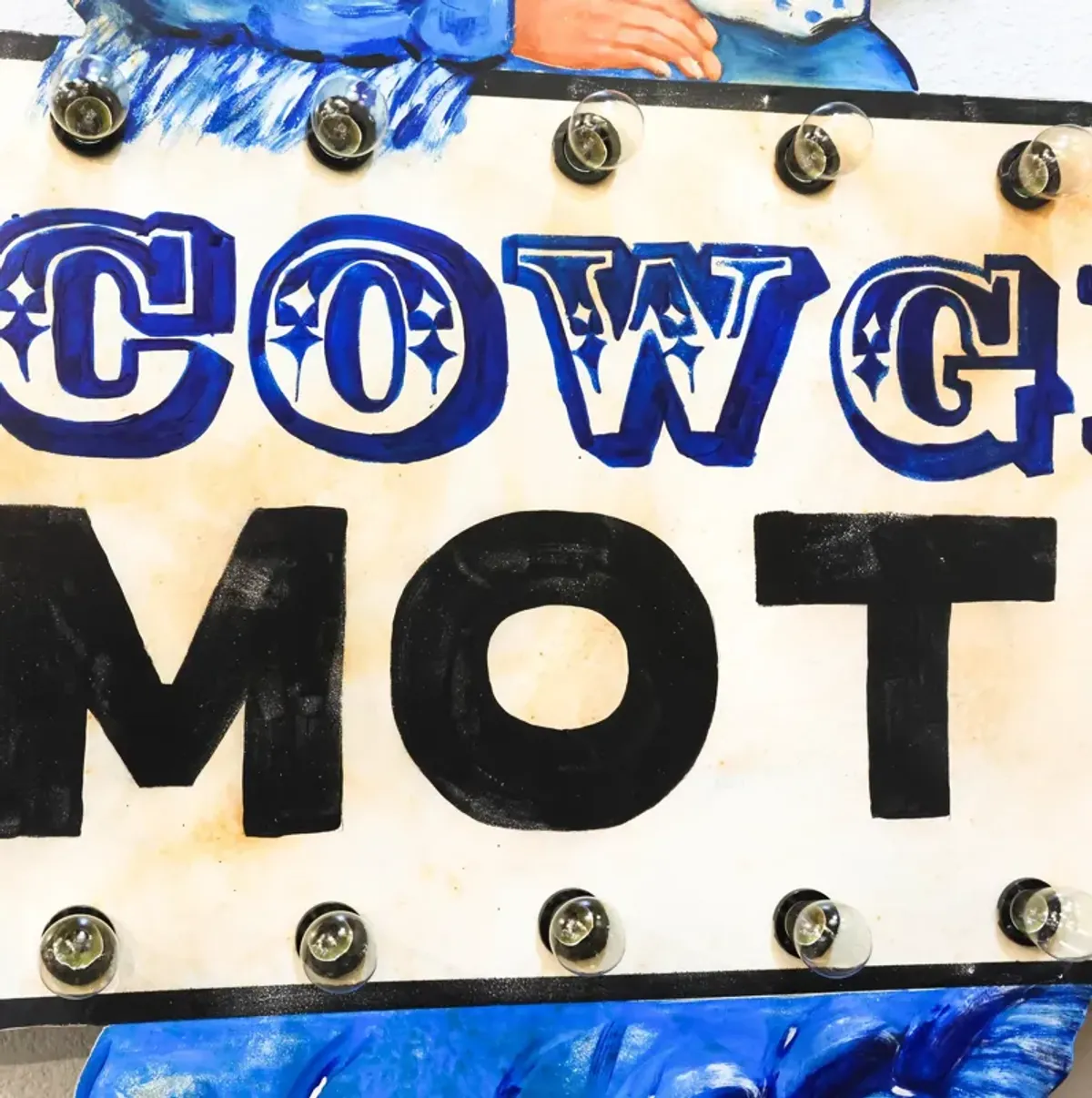 Cowgirl Motel Sign