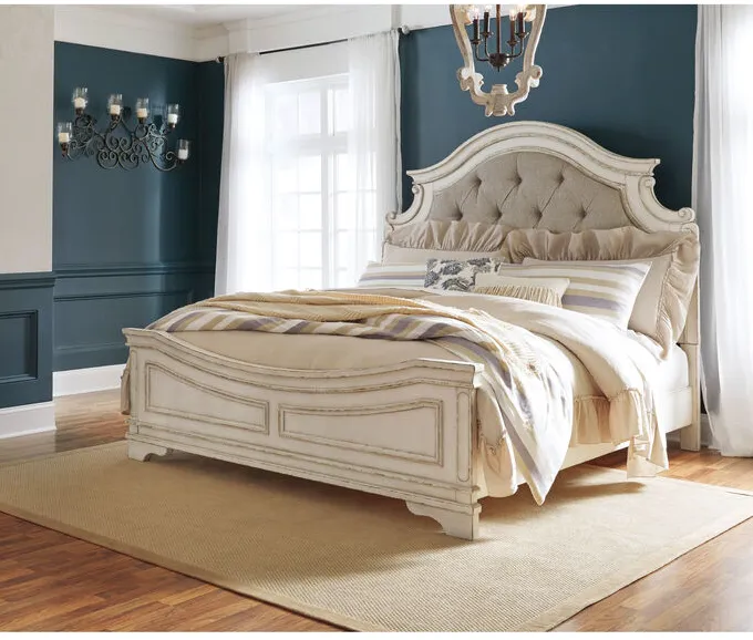 Realyn White King Upholstered Panel Bed