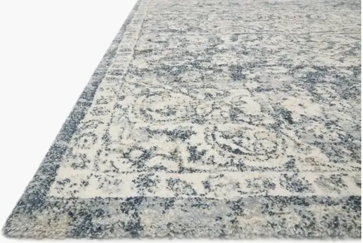 Theory Ivory/Blue Area Rug 5'W x 7'8"L