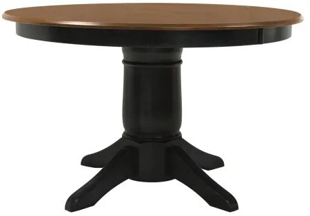 Gascho Riley 48-66" Round to Oval Dining Table