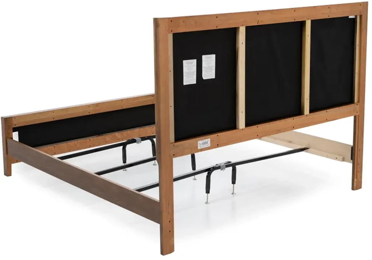 Crafted Cherry King Upholstered Panel Bed