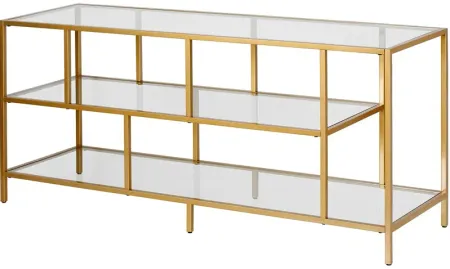 Withrop TV Stand with Glass Shelves in Brass Finish
