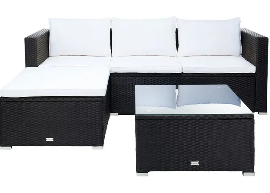 Basitan Black 4 Pc. Outdoor Sectional W/ Cocktail Table