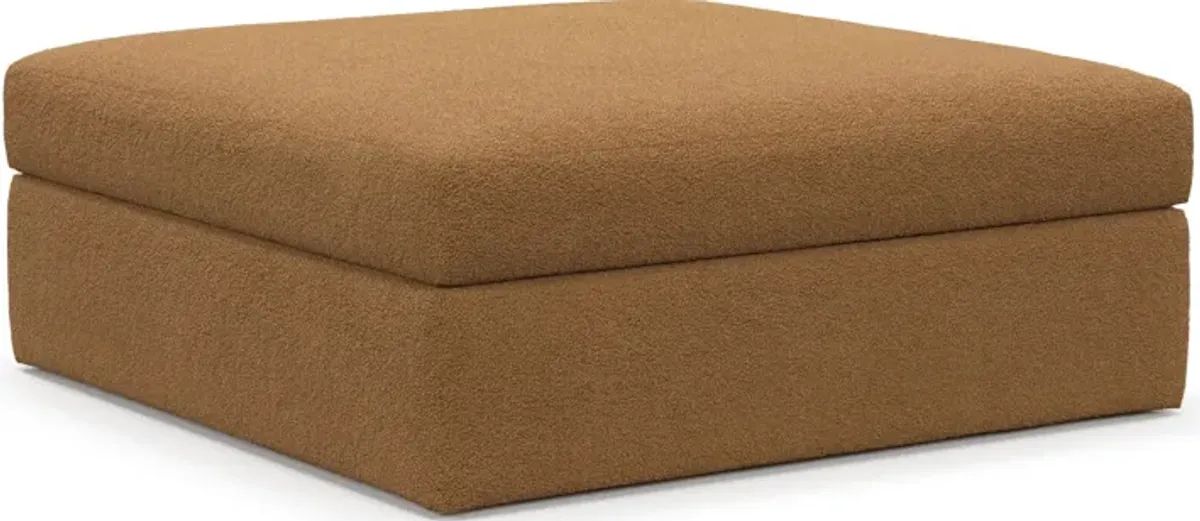 Collin Foam Comfort Ottoman - Nora Camel