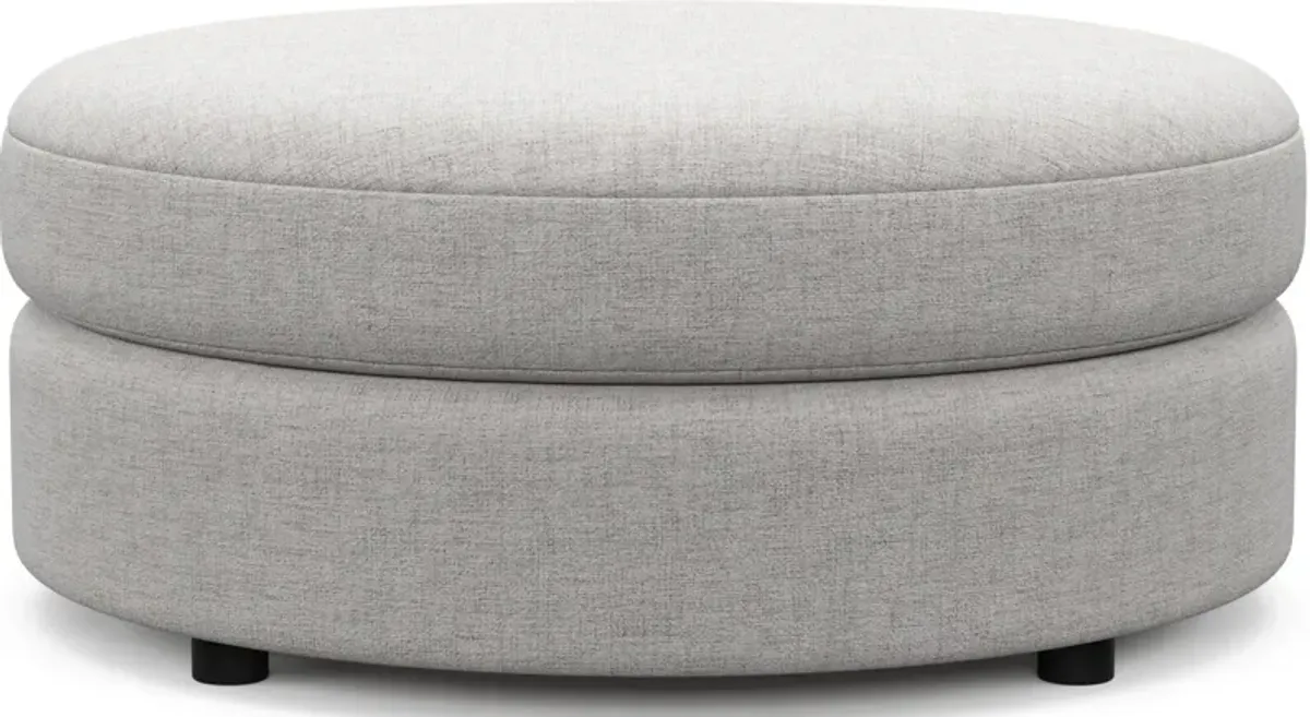 Allegra Foam Comfort Round Ottoman - Adario Fog