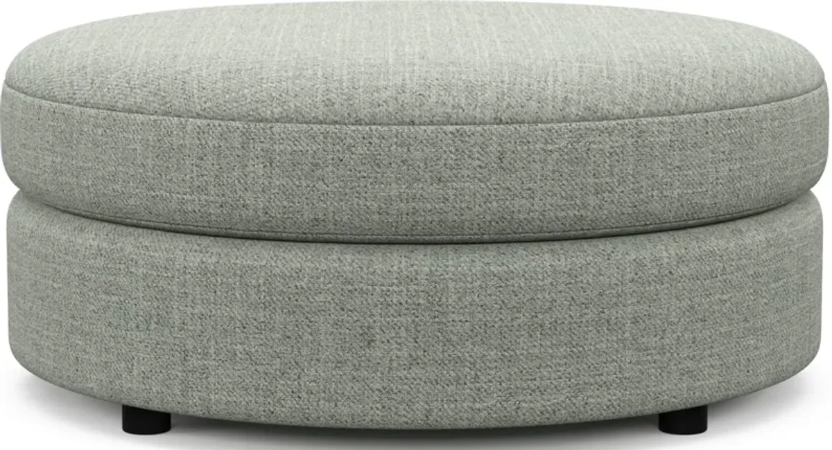 Allegra Foam Comfort Round Ottoman - Broderick Sea Glass